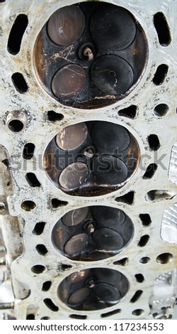 Cylinder head. parts in engine at car service station