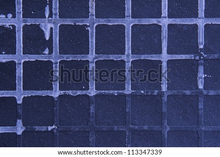 Seamless tileable grunge blue purple square marble stone background