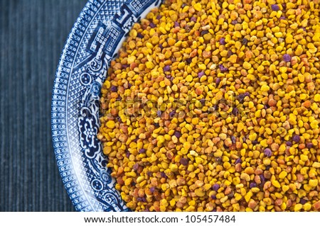 A close-up of pollen grains in a bowl