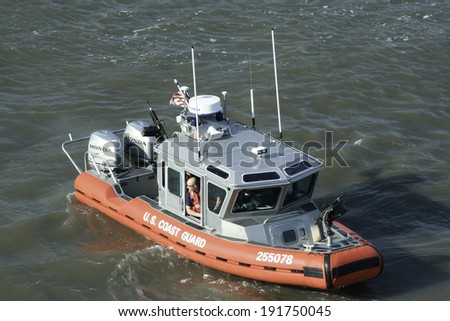 NEW YORK - APRIL 19: A United States Coast Guard boat patrols the Hudson River.  Photograph taken April 19, 2008.