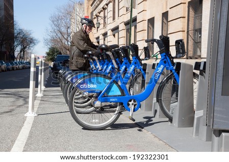 NEW YORK - APRIL 6:  A man rents a bicycle from Citibank\'s Citibike bicycle share program. Photo taken April 6, 2014.