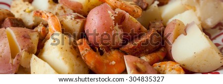Shimp, potatoes, and sausage make up a spicy low country boil