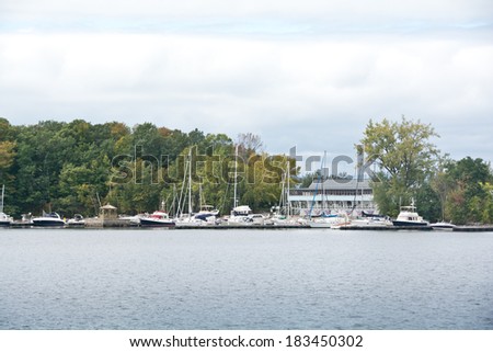 Shelburne, Vermont, USA - September 27, 2013: Sailboats line the docks on this autumn afternoon at the Shelburne Yacht Club, a popular mooring spot south of Burlington on Lake Champlain.