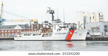 Portsmouth, NH, USA - August 2, 2014: USCG ship 615 is docked at the Portsmouth Naval Shipyard on this Saturday afternoon in mid-summer.