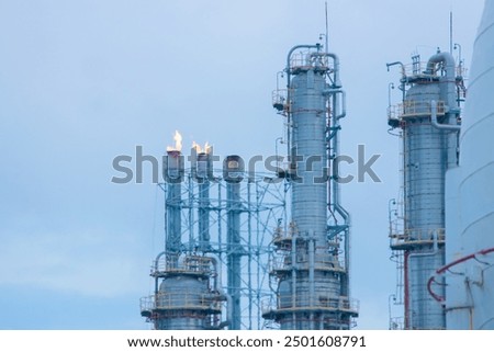 Similar – Image, Stock Photo Gas flaring at oil refinery in evening