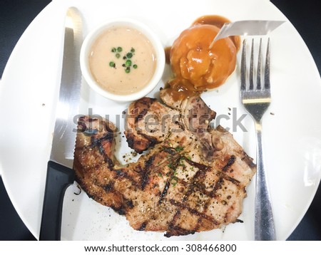 Pork chops Steak T-Bone Well done burn grill mark with pepper gravy sauce and mashed potatoes recipe