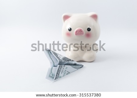 money plane with piggy bank,freedom payment concept.