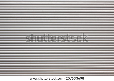 dirty metal roller shutter door as a background