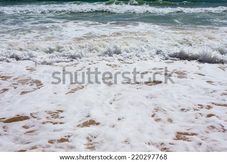 Beautiful clear mediterranean water lapping on the shore