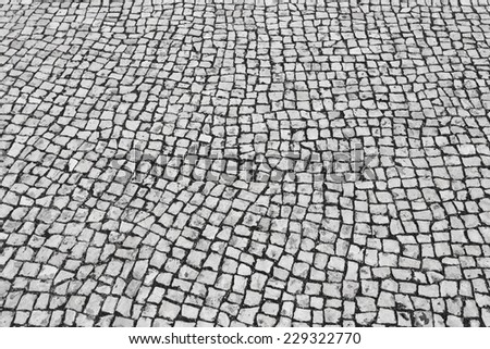 Background texture of typical portuguese walkway pavement