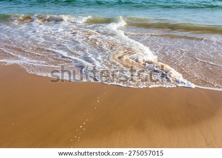 Beautiful clear mediterranean water lapping on the shore