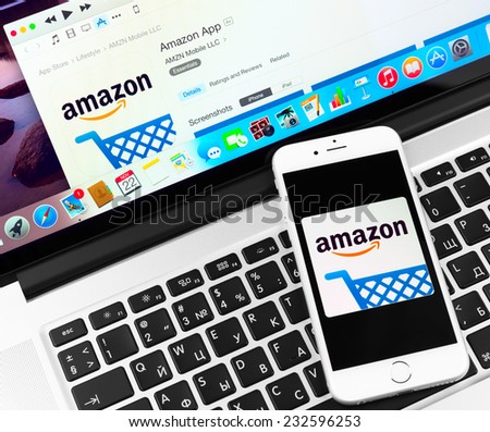 SIMFEROPOL, RUSSIA - NOVEMBER 22, 2014:  Amazon application on Apple iPhone 6 and Macbook display. Amazon is an American international electronic commerce company