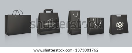 Set of mockup of realistic black paper bag with logotype. Corporate identity blank packaging, shopping bag paper mockup. Branding packaging template with handles. Gift boxing. Vector illustration.