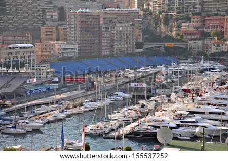 MONACO - MAY 24: Preparation for the qualifying races of Formula 1 Grand Prix de Monaco finishes, fashionable yachts are in port Hercules on May 24, 2012, Monaco