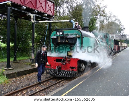 WAUNFAWR, WALES - SEPTEMBER 22: Steam narrow gauge train stands on the station before departure to Rhydd Ddu on September 22, 2007 in Waunfawr, Wales.