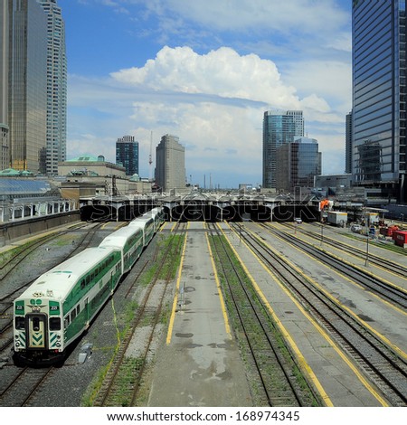 TORONTO - JUNE 28: Passenger diesel train departs from Toronto Union station on June 28, 2011 in Toronto, Canada.