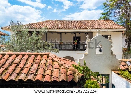 White colonial architecture and tiled roofing in the town of Villa de Leyva in Boyaca department in Colombia