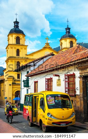 BOGOTA, COLOMBIA - JUNE 17: A bus and other traffic pass through the historic Candelaria neighborhood in Bogota, on June 17, 2012.