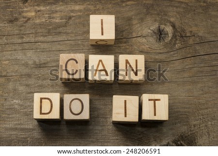 I can do it text on a wooden background