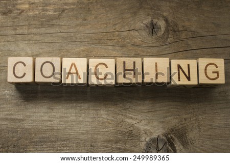 coaching word on a wooden blocks