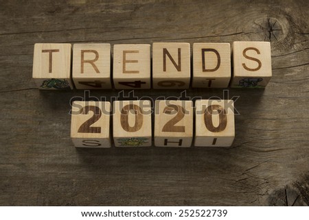 Trends for 2020 text on a wooden background