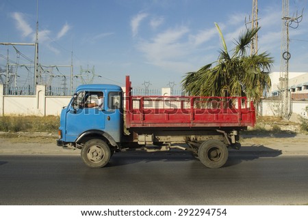 TUNIS, TUNISIA - MAY 29: Old rusty truck on road on May 29, 2015. Using old rusty trucks is the most common way of transporting cargo in Tunisia.