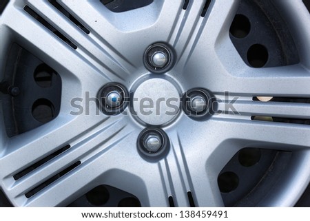 Close up of an isolated modern aluminum alloy wheel