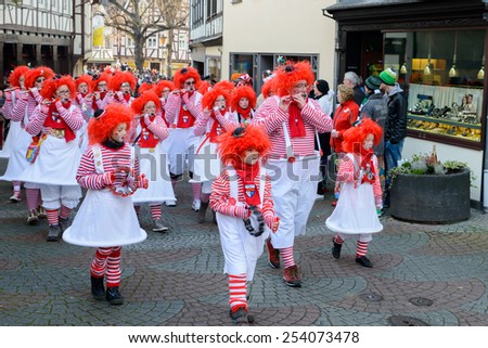LINZ AM RHEIN, GERMANY 16 FEBRUARY 2015 - Unidentified persons celebrating a carnival procession to celebrate the end of Karneval season, an annual event held throughout certain regions in Germany