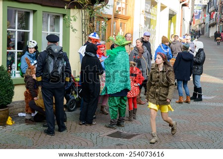 LINZ AM RHEIN, GERMANY 16 FEBRUARY 2015 - Unidentified persons celebrating a carnival procession to celebrate the end of Karneval season, an annual event held throughout certain regions in Germany