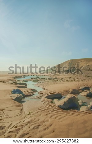 Watercolour painting of Southerndown beach in south wales in the uk, an area of natural beauty