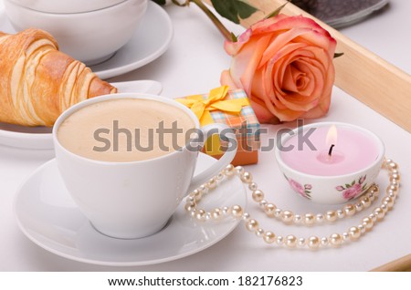 Breakfast on wooden tray with genuine pearls, present box and a rose