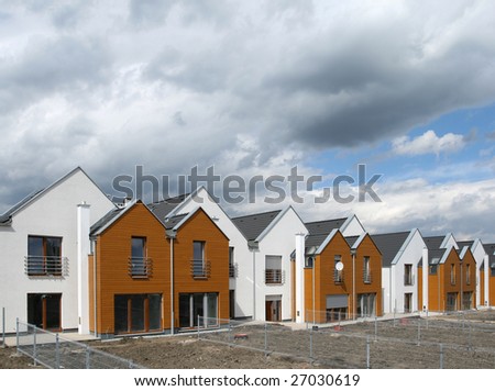 Modern singly-family terraced homes in Poland (Europe).