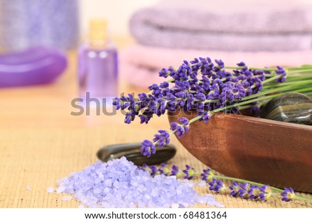 Lavender composition - spa and wellness resort. Liquid soap in background.