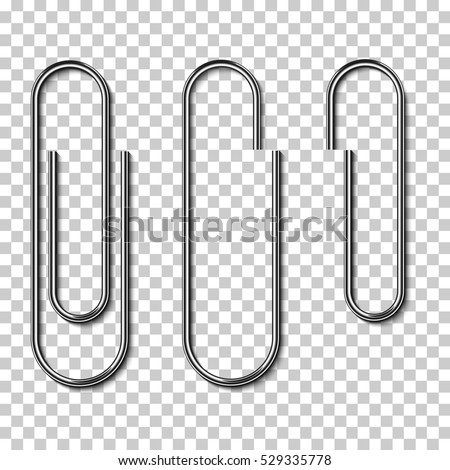 Metal paper clips isolated and attached to paper