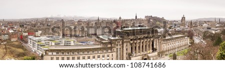 Panoramic view of Edinburgh. The photograph is taken from Calton Hill Park and displays a wide view of Edinburgh, the capital of Scotland.