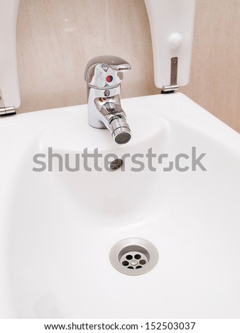 Bidet detail with tap and drain