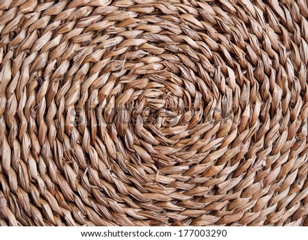 Straw background with a circular design