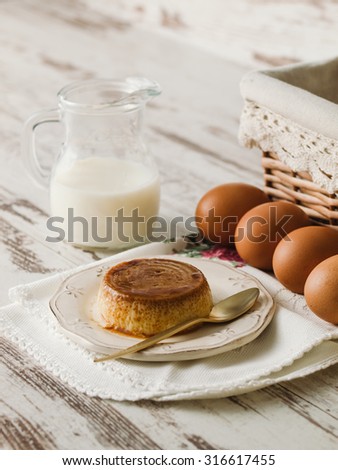 Caramel custard with eggs and milk in a studio shot
