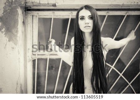 portrait BLACK and white of Vogue style erotic young & beauty emo girl in vintage city street