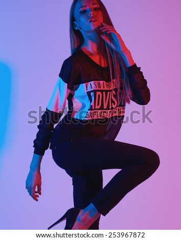Vogue style photo of sensual woman red and blue toning