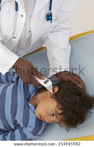 medical visit - young boy- temperature measurement