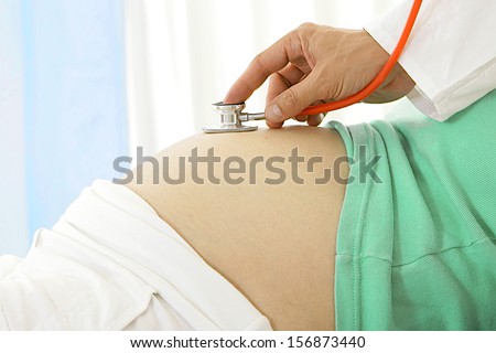 pregnant woman examination -fetus  heart beat checking