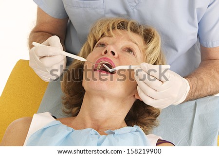 senior medical visit at the dentist