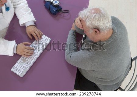 Depressed senior man visiting doctor