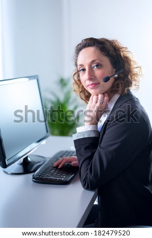 portrait of a beautiful young woman telephone operator