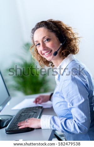 portrait of a beautiful young woman telephone operator