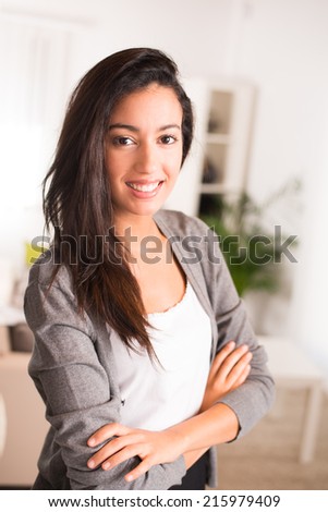 cheerful young businesswoman real estate agent visiting new house for sale or rent