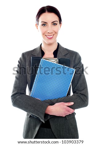Corporate lady posing with clipboard and spiral notepad