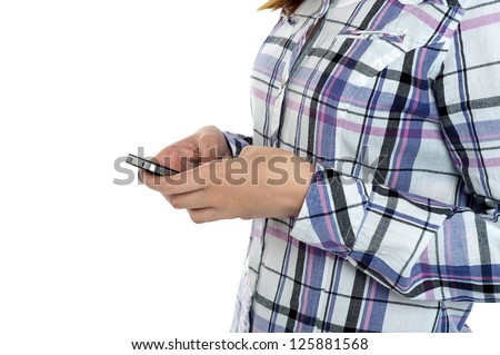 Cropped image of a girl in checked shirt sending messages. All on white background.