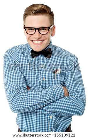 Smiling young nerd posing with crossed arms